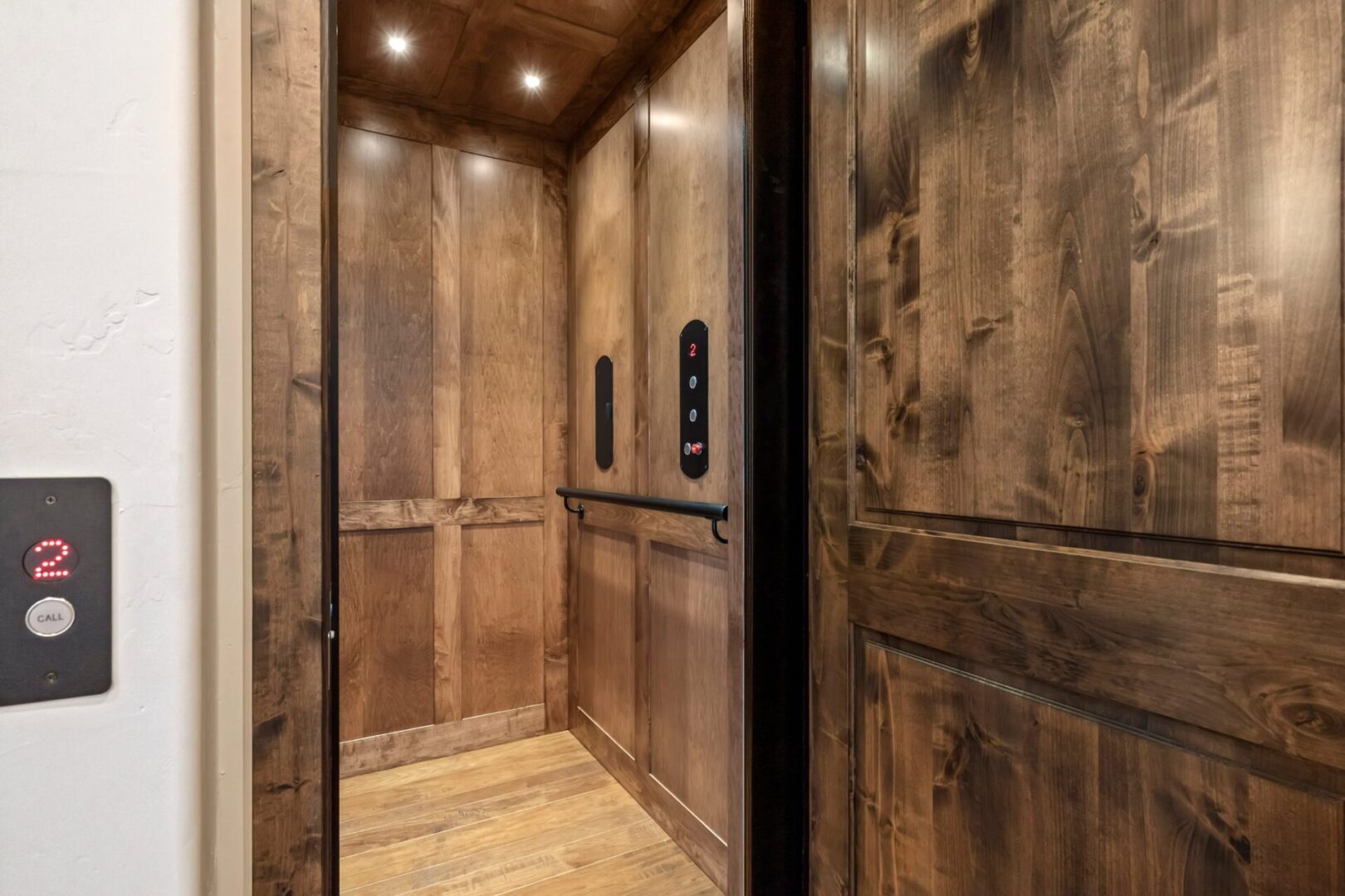 Wood paneled in home elevator for aging in place feature