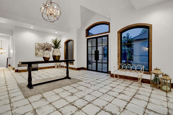 White tile floor in atrium front entry