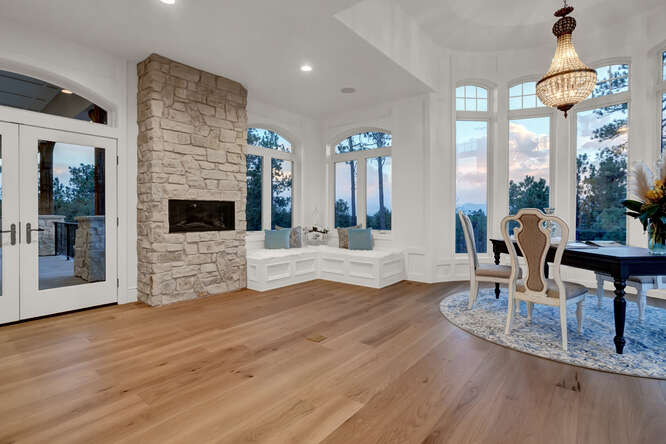 Writing desk with vintage pendant light with fireplace and built-in bench