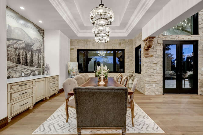 French Country Formal Dining Room with 3 crystal chandeliers