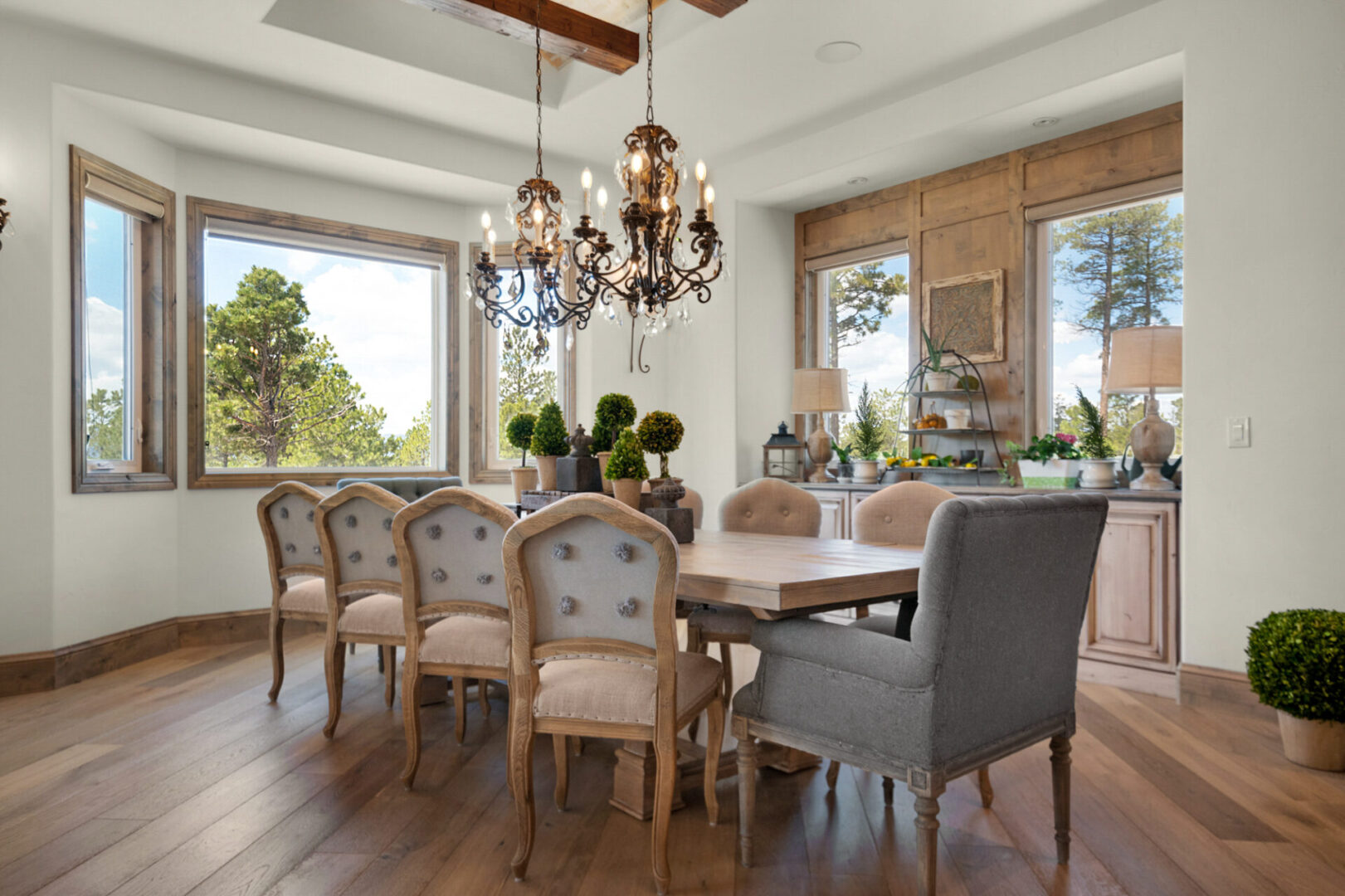 formal dining room with barrel ceiling with brick and wood beams