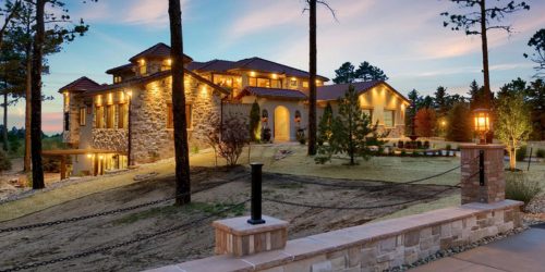 Front elevation of Spanish Revival luxury custom build home