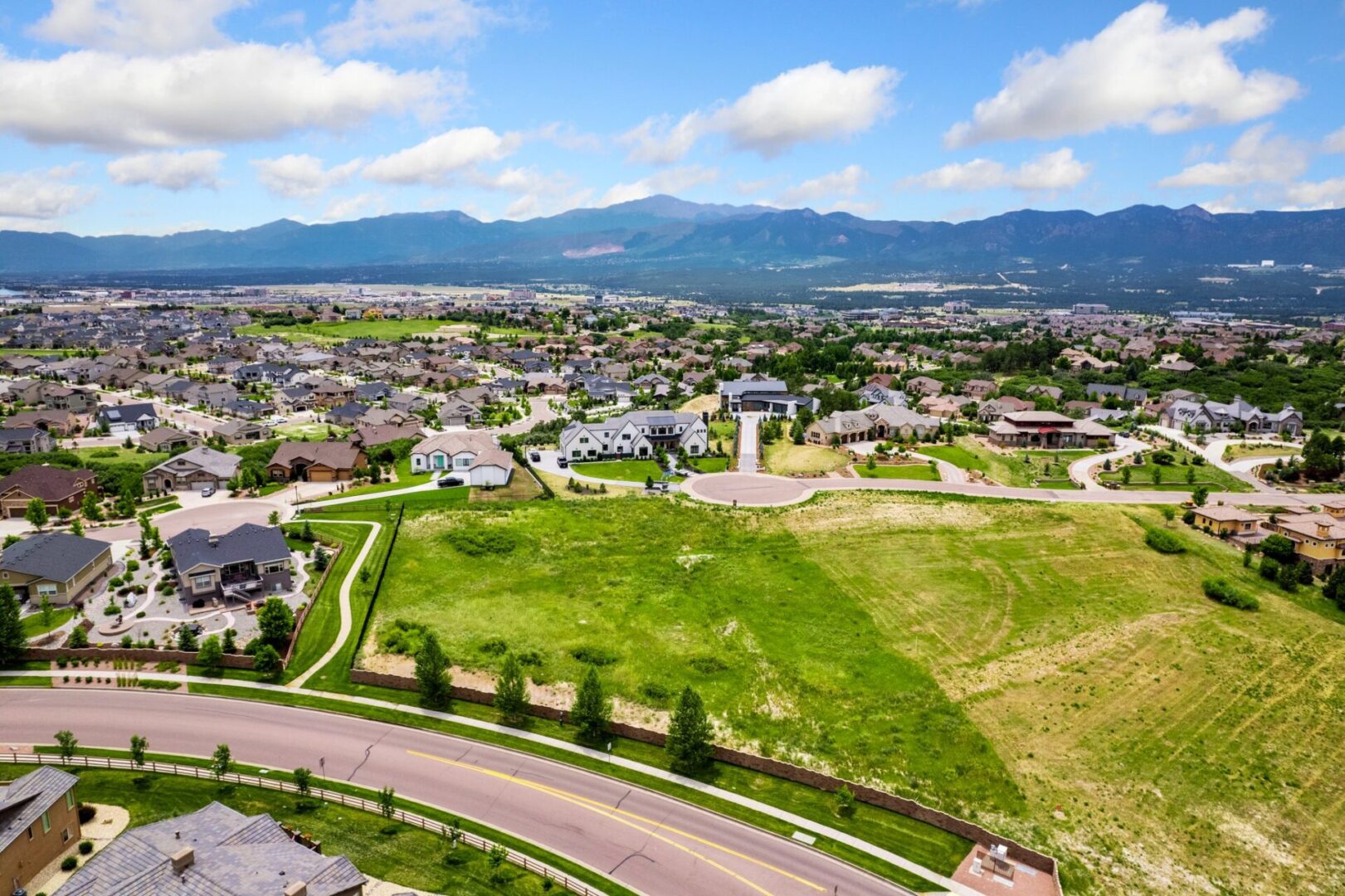 1904 Vine Cliff Heights Available Lot Flying Horse-02 aerial view of available lot in flying horse toscano neighborhood to build a custom home